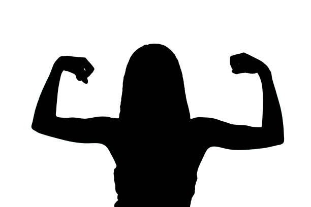istock girl showing muscles silhouette 1371185818