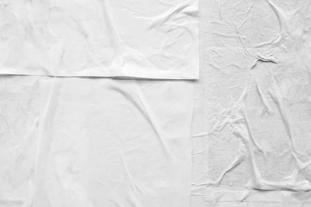istock Blank white crumpled and creased paper poster texture 1371187271