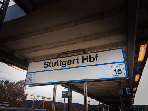 Stuttgart, Germany - DEC 08 2019 Stuttgart Hbf train station sign on the platform