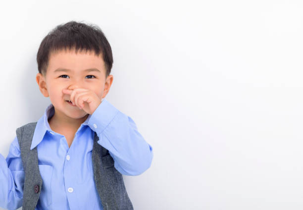 istock Closeup asian  Little boy face on white background 1371192406