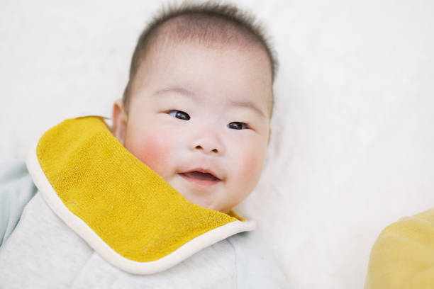 Laughing Asian boy baby