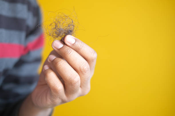 istock man hold his list hair with copy space 1371204523
