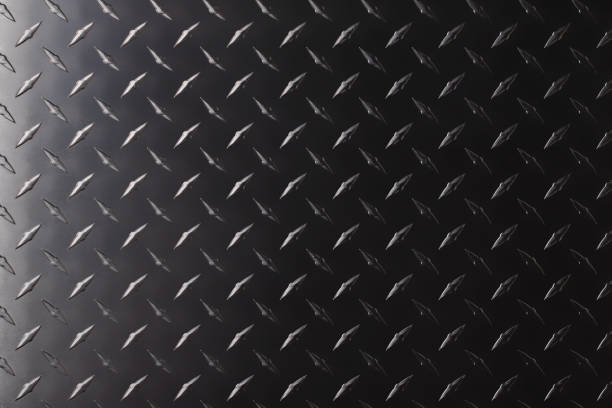 textura de metal escuro com um padrão, fundo de aço. placa de ferro preta. - 15821 - fotografias e filmes do acervo