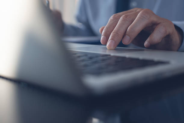 istock Businessman working on laptop in office 1371214156