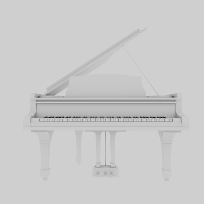 White grand piano isolated on the white background.