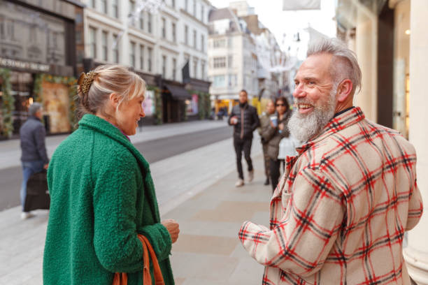 istock Happy senior couple having fun exploring city while on vacation 1371218074