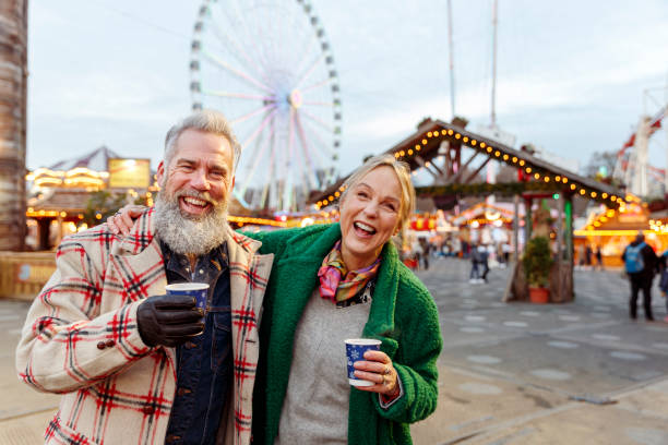 Senior couple having fun at winter carnival