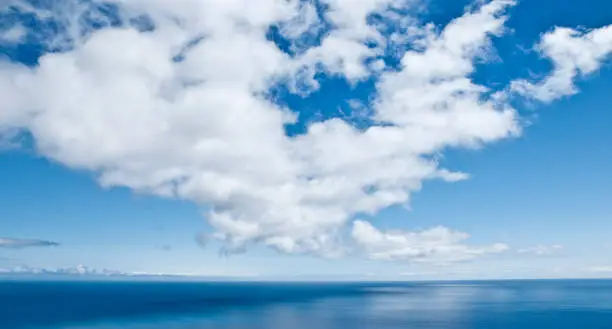Clouds over the endless expanse of the Atlantic Ocean.
