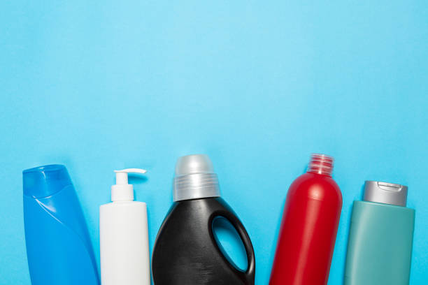 istock cleaning agent on a blue background on the side. Professional cleaning products, general cleaning. Household chemicals top view 1371223132