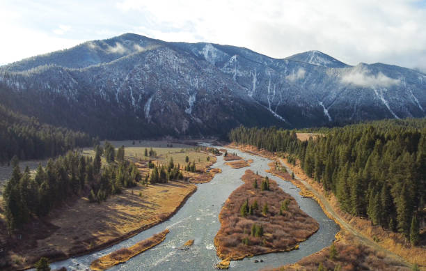 Drone view of Quake lake, and mountains Montana. Quake Lake is known for the 1959 Hebgen Lake earthquake , that formed Quake Lake.