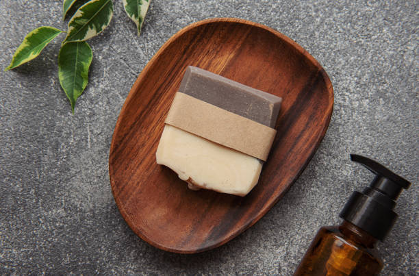 istock Handmade soap bar and green leaf 1371227478