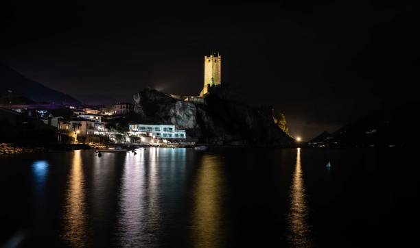 istock Lake garda, Malcesine at night with reflections 1371231694