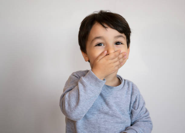 istock Cute toddler boy making a face portrait 1371235094