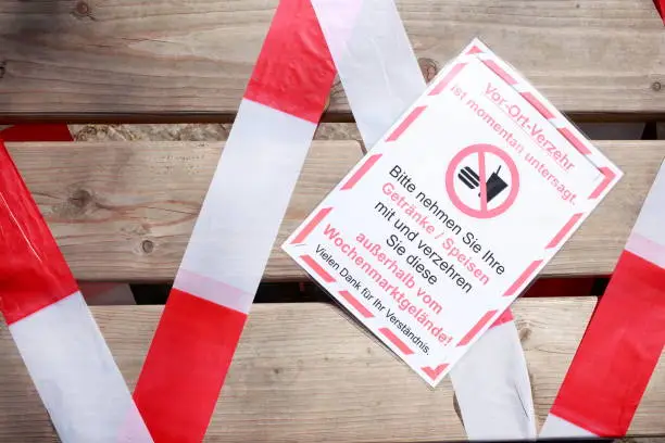 Barrier tape, sign consumption prohibited due to coronavirus, Germany, Europe