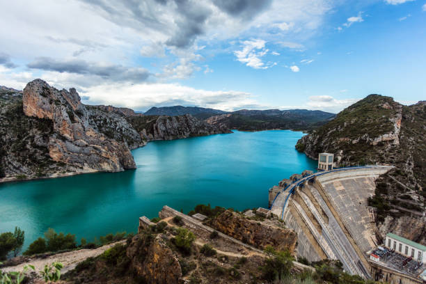 Dam at emerald reservoir in the mountains