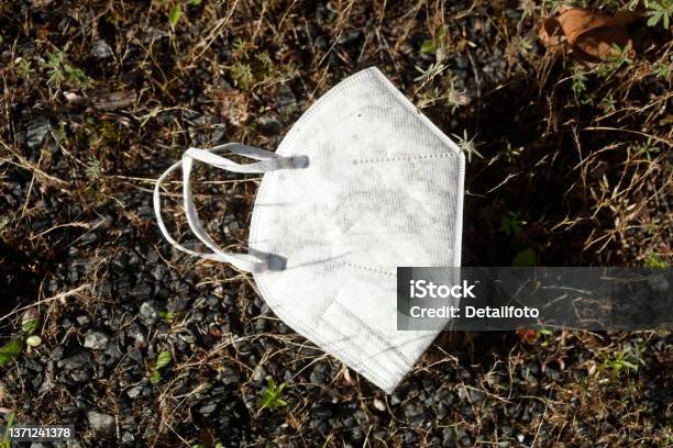Discarded Ffp2 Respirator Lies On The Floor Coronamüll Germany Europe Stock Photo - Download Image Now