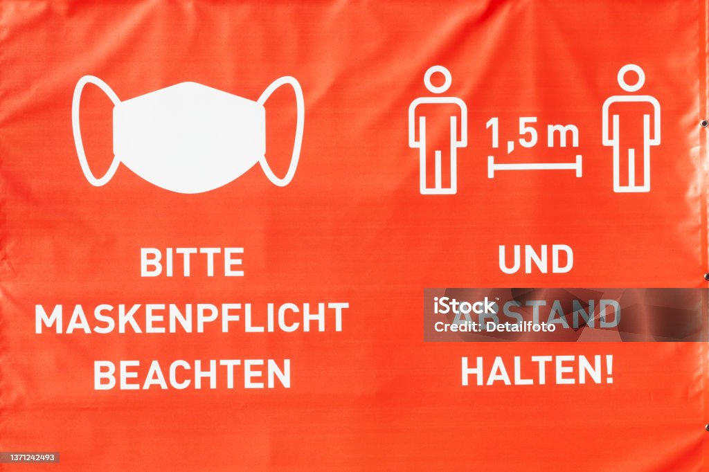 Use shield mouthguard and keep your distance, Germany, Europe Use a face mask and keep your distance, Germany, Europe Color Image Stock Photo
