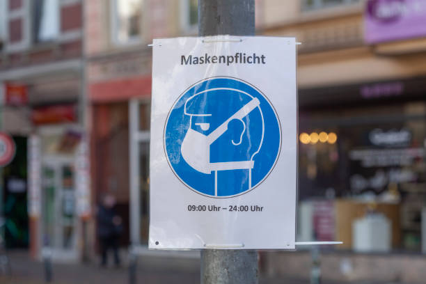 istock Use shield mouthguard, mask obligation, Germany, Europe 1371242851