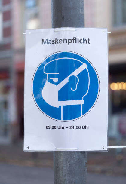 istock Use shield mouthguard, mask obligation, Germany, Europe 1371243169
