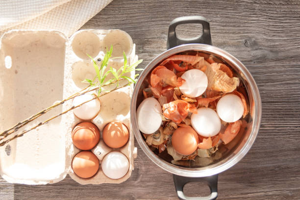 istock Prepare to paint the egg for Easter. Onion husks, egg and towel are on a wooden table. 1371245421