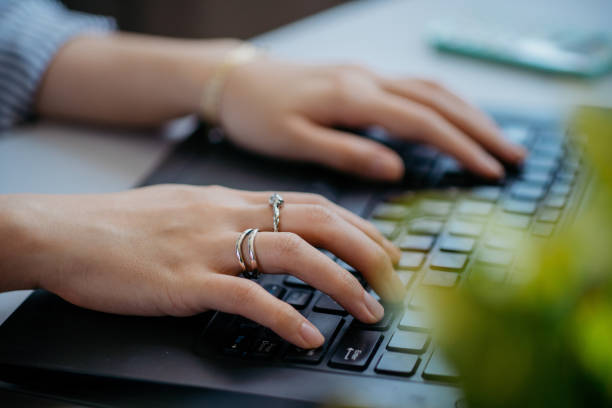 Fashionable woman working with notebook