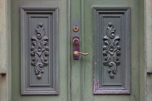istock Old wooden doors with carving details 1371248710