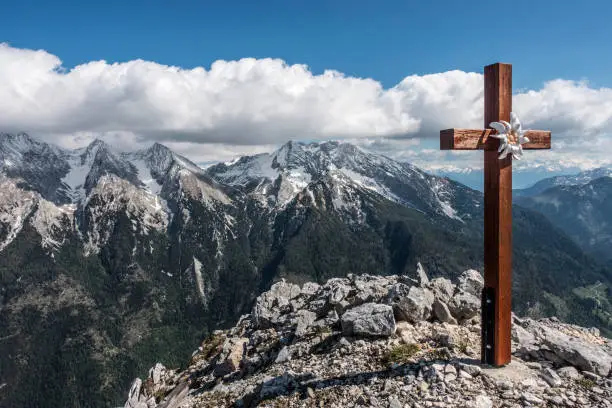 Summit cross in the Berchtesgaden Alps, Ramsau, Bavaria, Germany.