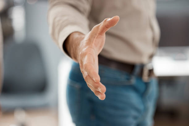 istock Shot of a unrecognizable businessman ready to shake hands 1371249099