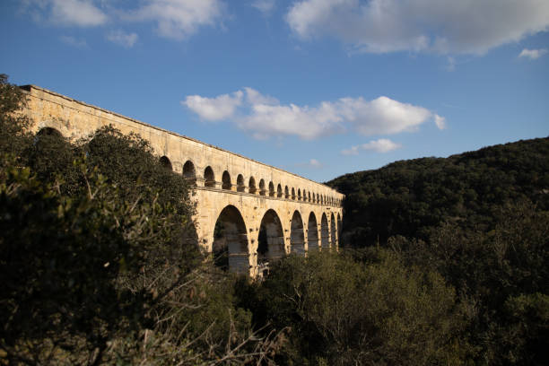 istock View of the Pont du Gard illuminated by the sun (Occitanie, France) 1371249367