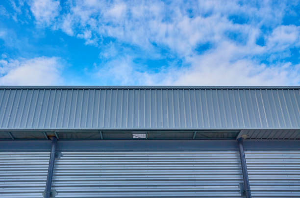 istock Metal sheet building with vivid blue sky 1371250497