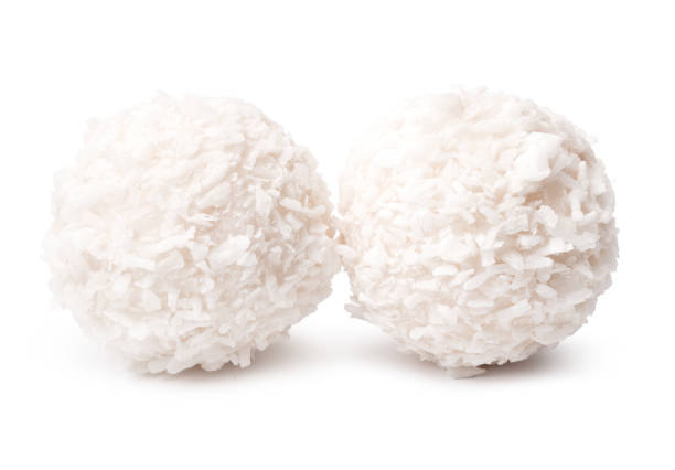 istock Sweet round coconut candy isolated on white 1371250551