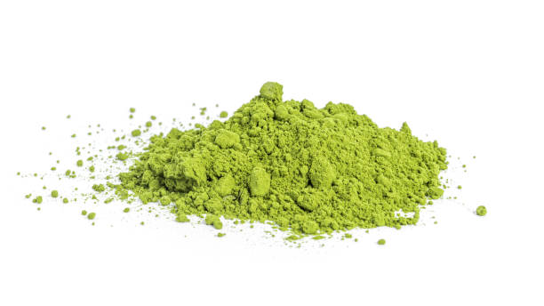 istock Green matcha powdered tea isolated on white background 1371250775