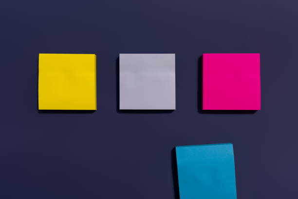 istock Colorful sticky notes isolated on purple background. Sticky notes background. Empty copy space blank paper 1371253133
