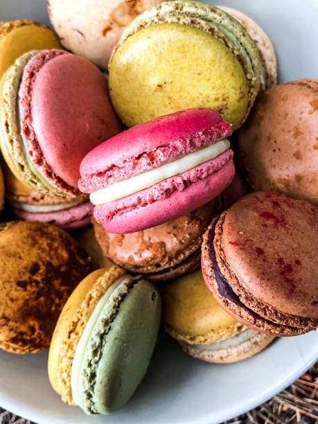 Macarons Bowl of macarons adac stock pictures, royalty-free photos & images