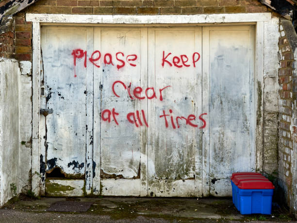 istock A garage door with the words please keep clear at all times 1371258490