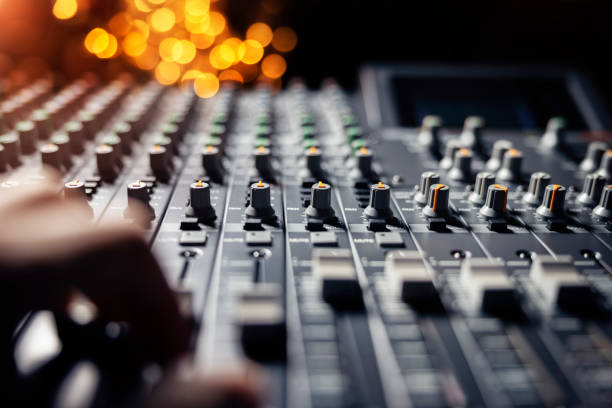 sound recording studio mixing desk with engineer or music producer - human finger sound mixer music producer imagens e fotografias de stock