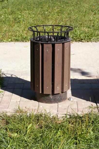 istock Dustbin in Park at dry sunny summer day 1371261408