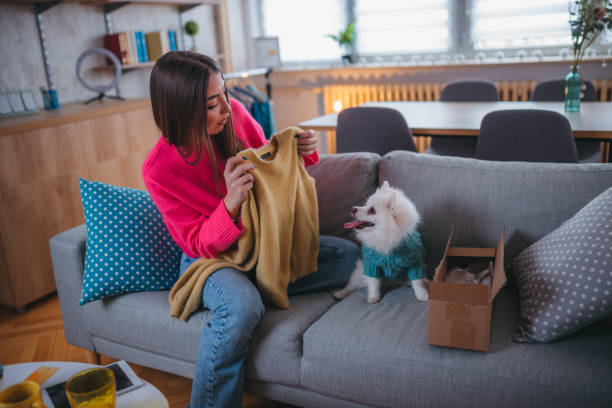 istock Woman customer opening cardboard box parcel 1371263085