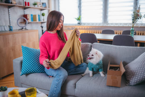 istock Woman customer opening cardboard box parcel 1371263094