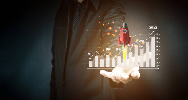 istock Businessman analyzing forex trading charts, financial data. 1371270684