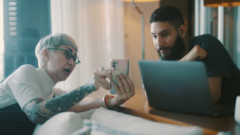 Mother and son learning to investing together.