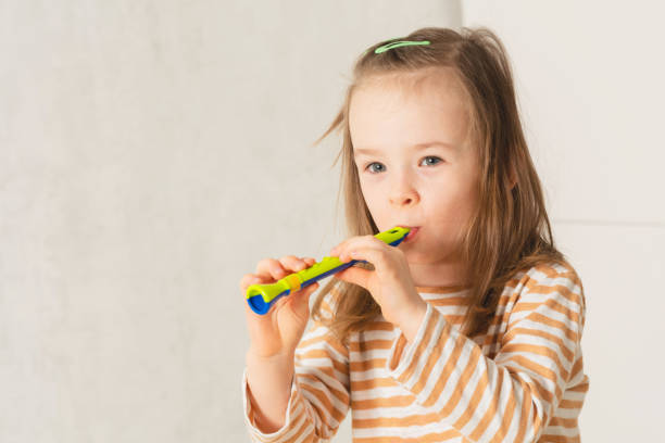 Child at home learning to play musical instruments