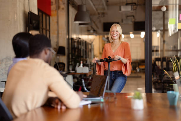 istock Diverse group of white collar workers assembling in their office for a meeting 1371284690