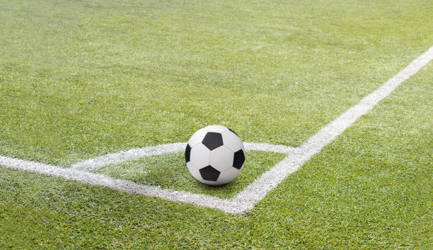 istock Soccer football on corner kick line 1371285882