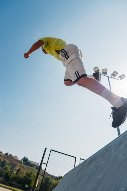 istock Handsome man train parkour at urban place 1371287032
