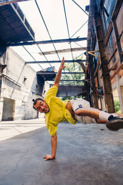 istock Parkour man exercise handstand outdoors 1371287258