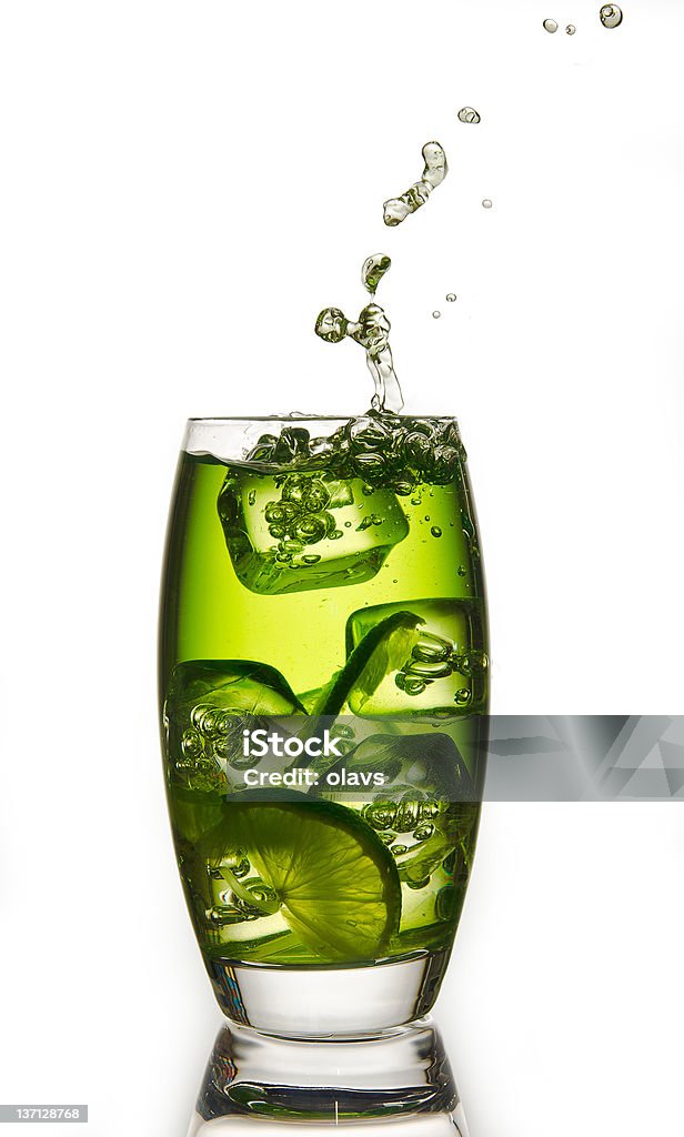 lime with a splash lime drink with a ice and a splash Citrus Fruit Stock Photo