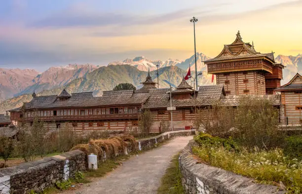 Ancient Bhima Kali Hindu temple with Kinnaur Himalaya mountain range at sunrise at Sarahan, Himachal Pradesh India
