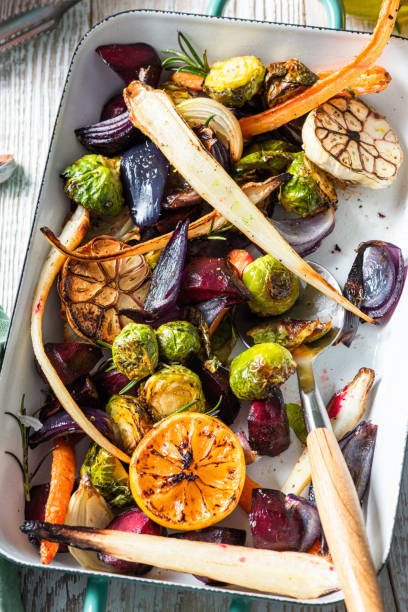 istock Mixed root vegetable roast with herbs. Healthy simple grill food 1371293237