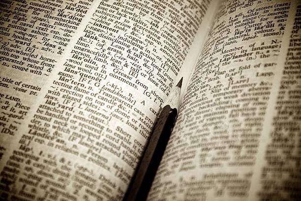 istock Pencil as bookmark in a dictionary 137129802